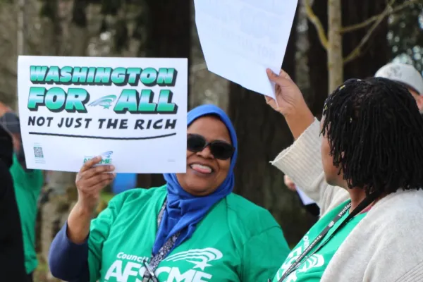 wa for all not just rich sign holding