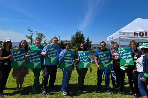 WFSE Members at View Park holding FAIR CONTRACT NOW signs