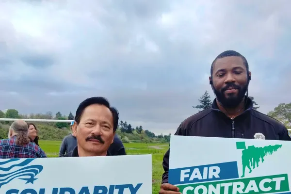 WFSE members with Fair Contract Now signs 8