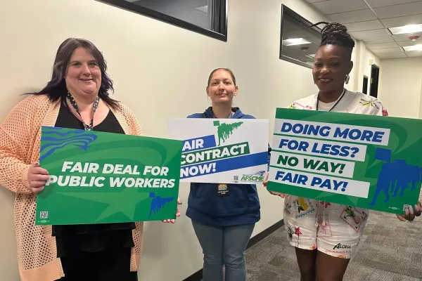 WFSE members with Fair Contract Now signs 7