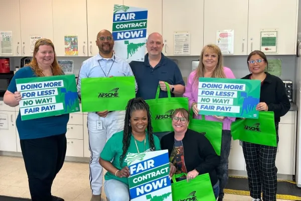 WFSE members with Fair Contract Now signs 5