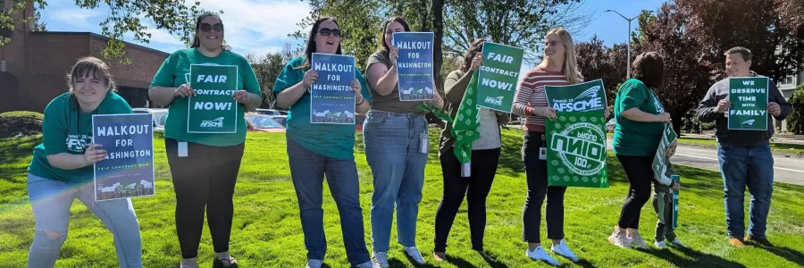 WFSE DCYF members hold signs saying Walkout for Washington