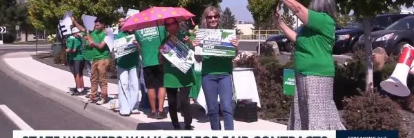 Members showing support for strong contract by walking off the job.
