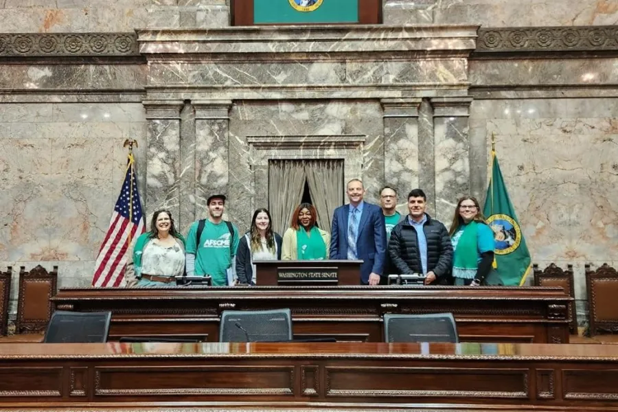 WFSE members stand in the Washington State Senate