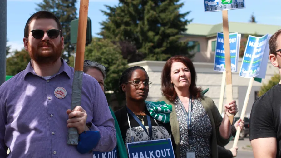 members standing looking cool at Walkout for Washington in 2024
