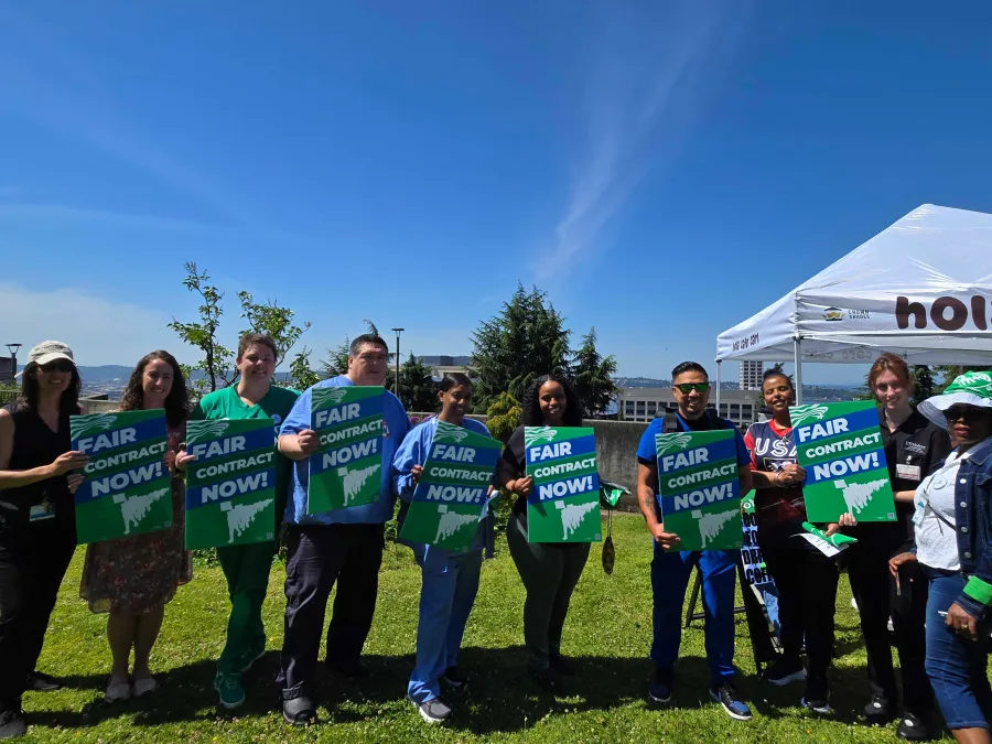 WFSE Members at View Park holding FAIR CONTRACT NOW signs