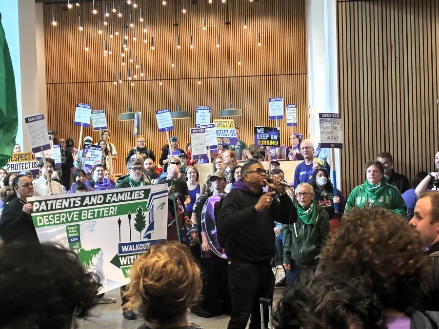 WFSE members rallying in the lobby of the gateway building