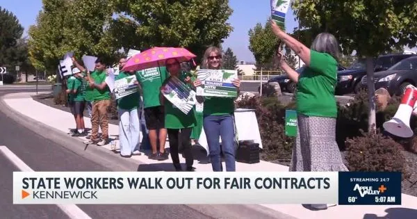 Members showing support for strong contract by walking off the job.