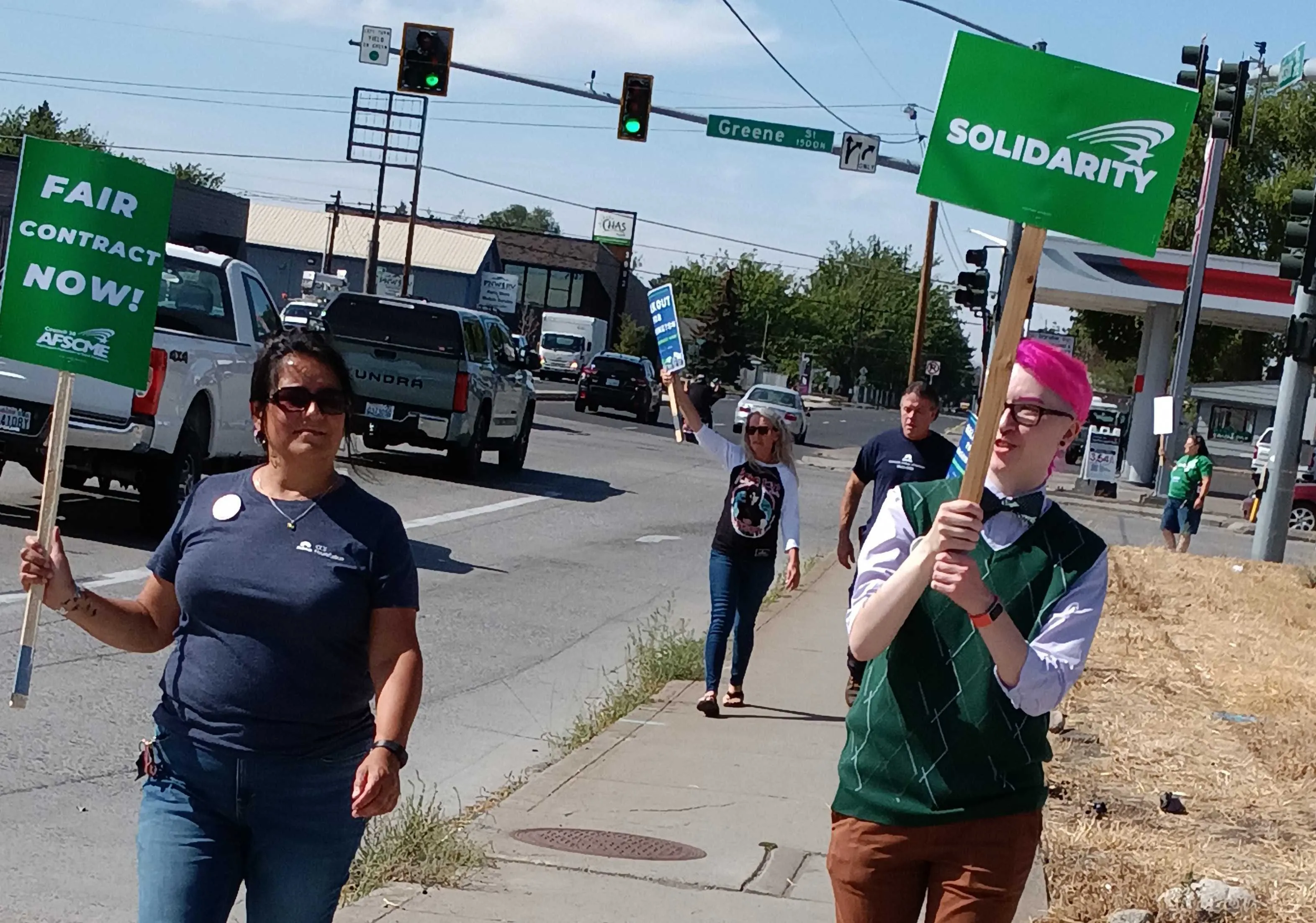 community engagement. WFSE members holding signs