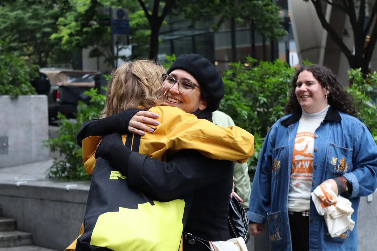 workers hugging