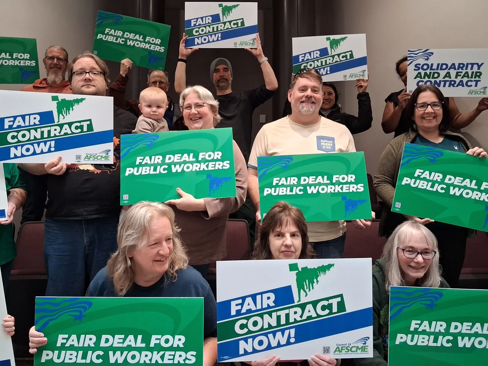 WFSE members holding signs on bargaining day