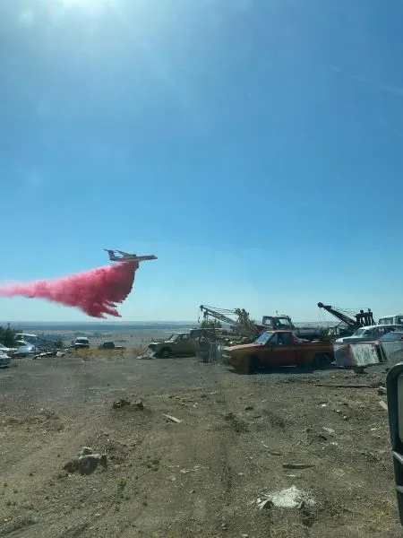 Plane dumps fire resist on town