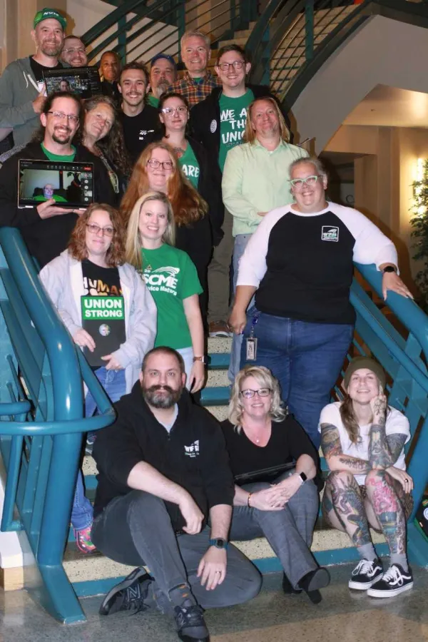 A photo of the WFSE GG bargaining team after bargaining concluded around 4:30am